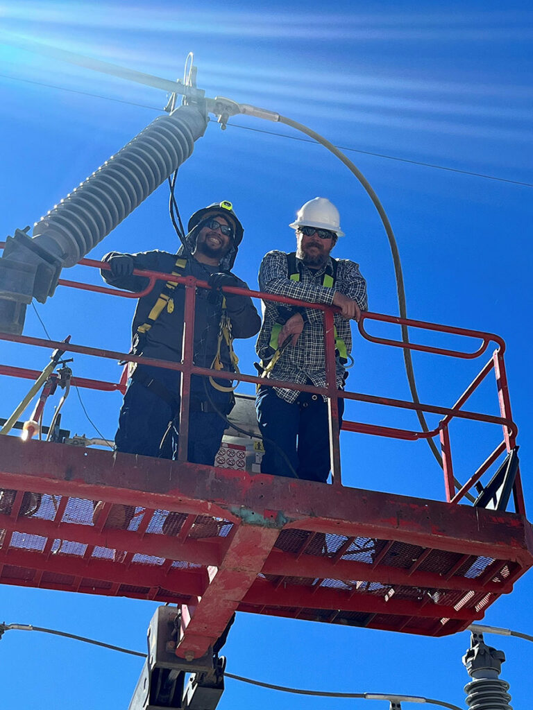 CAP Employees with electrical equipment