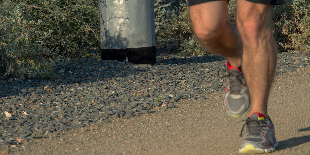 Man Running on a Trail