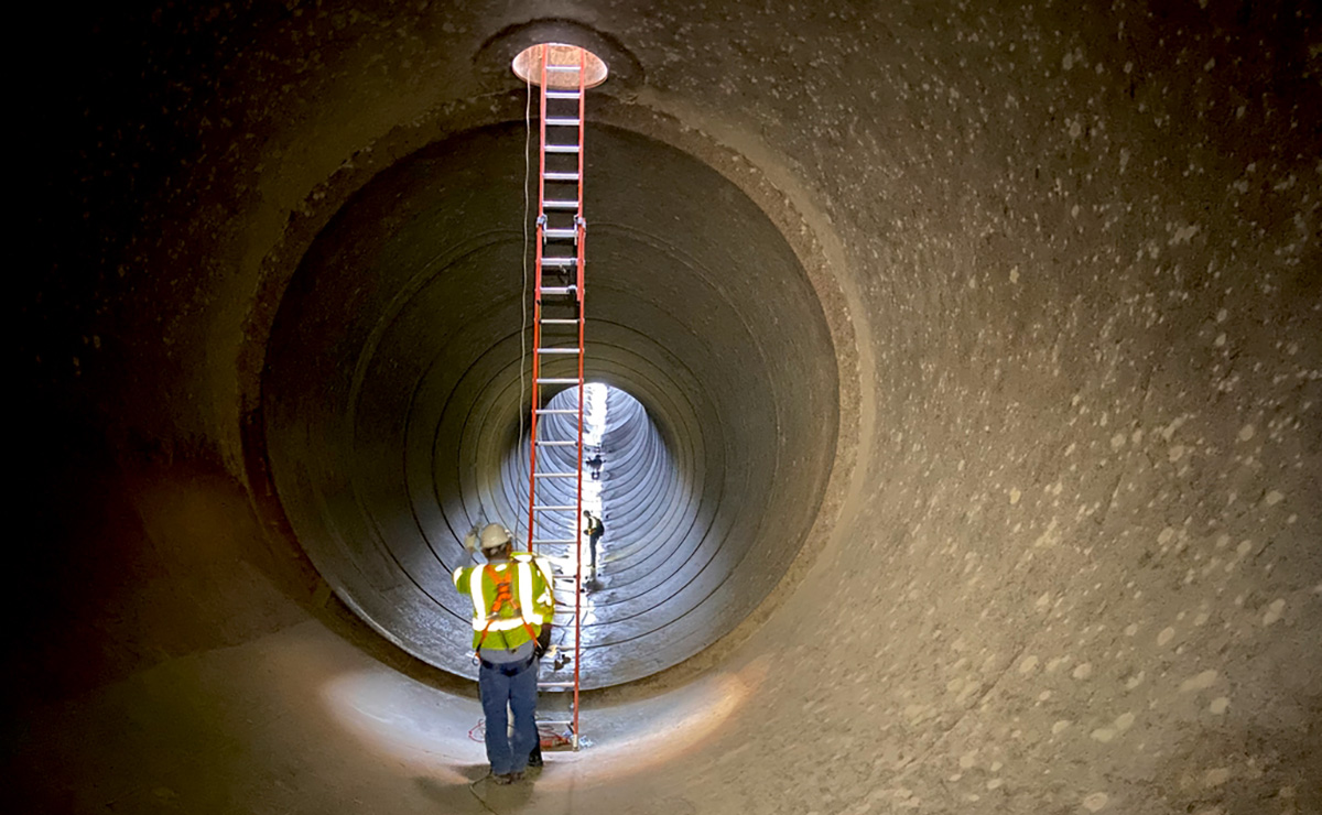 People Inside Siphon Pipe