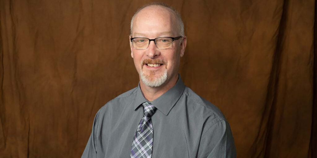 Headshot of CAP employee Phil Rettinger