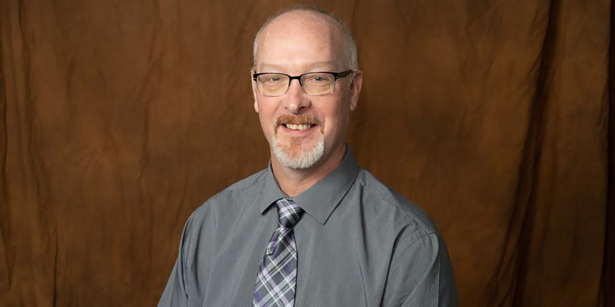 Headshot of CAP employee Phil Rettinger