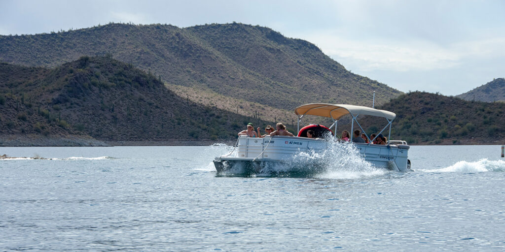 Boaters in pontoon boat on Lake Pleasant