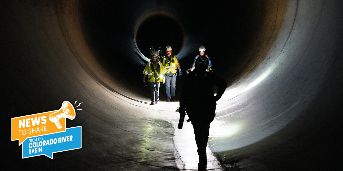 A group walking through the Agua Fria Siphon