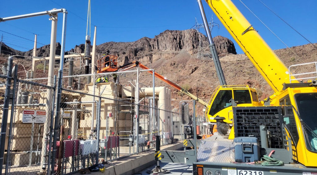 Crane working by electrical switchyard