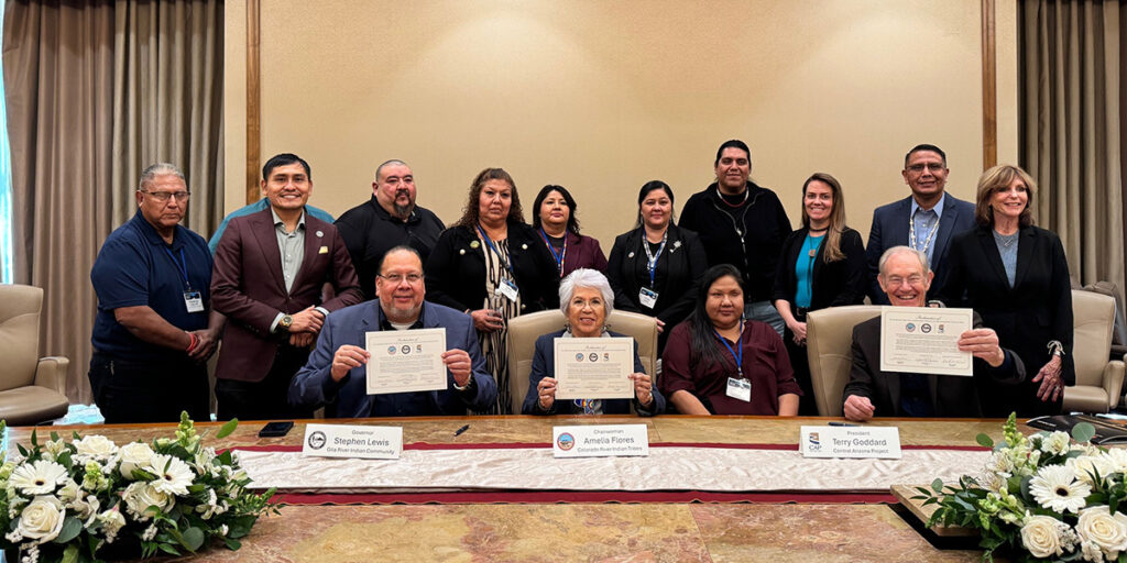 Colorado River Indian Tribes, the Gila River Indian Community and the Central Arizona Water Conservation District representatives signing a Colorado River protection proclamation.