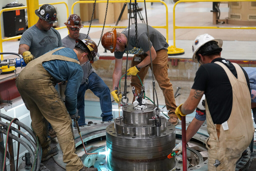 CAP millwright mechanics working at the Mark Wilmer Pumping Plant