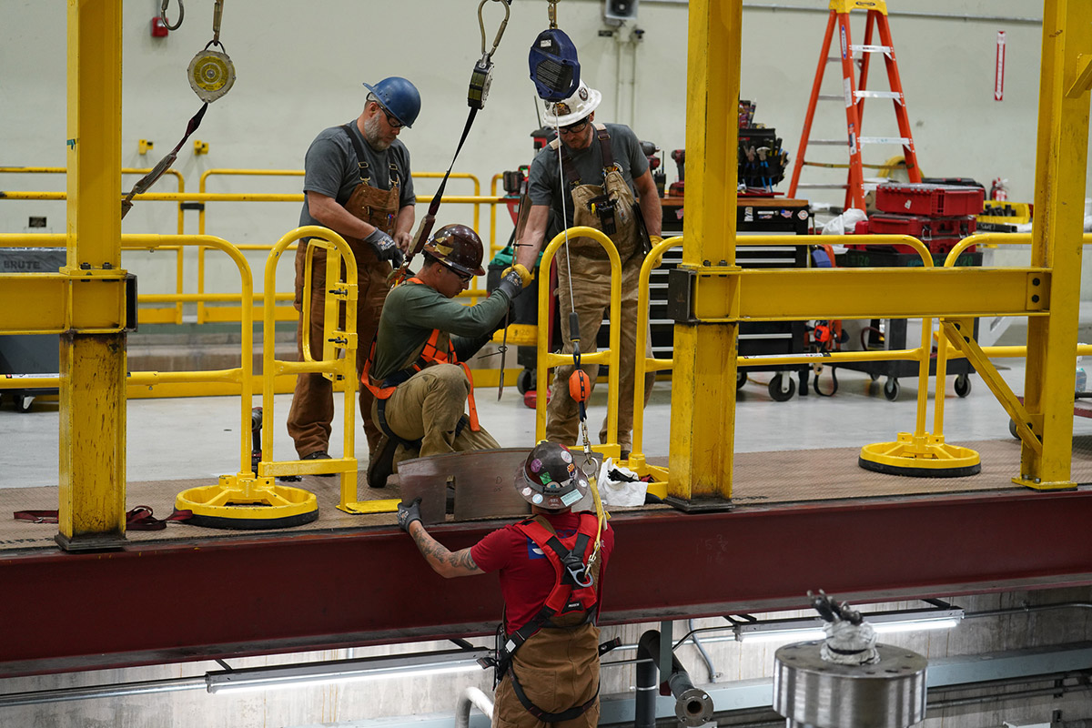 CAP employees performing maintenance work